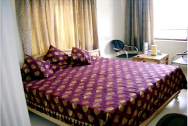 Sapphire Inn Bhimtal Bilik gambar
